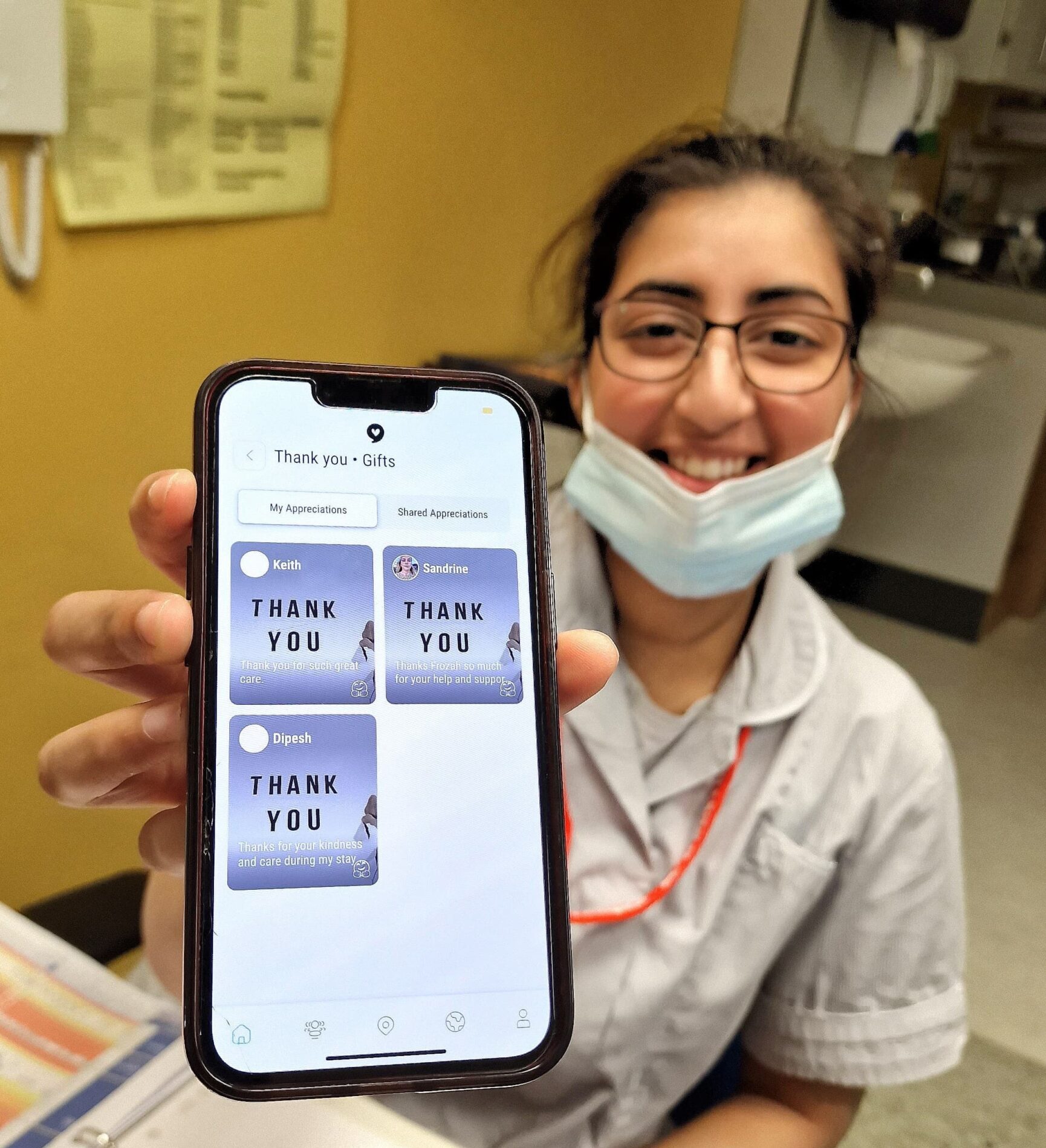 Healthcare worker holding a phone